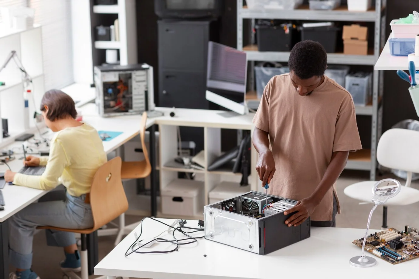 people-repairing-computer-chips_23-2150880955